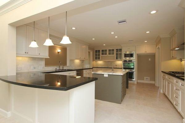 Full kitchen remodel 
 Black galaxy around the kitchen and marble in the island.