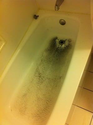 This is how they left our bathtub after "fixing" the drain.