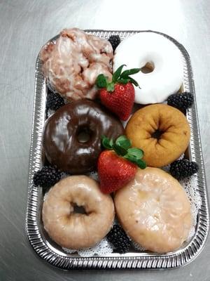 A garnished display of fresh donuts is just what you need to start your day!