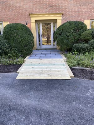 New concrete paver walkway with handicap ramp.