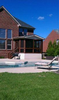 Custom designed and built screened porch with Trex composite decking