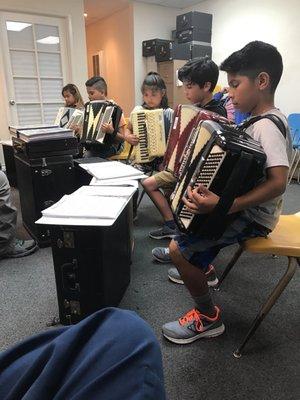 Mr S teaching his class as only he can do. Highly recommend this music school!