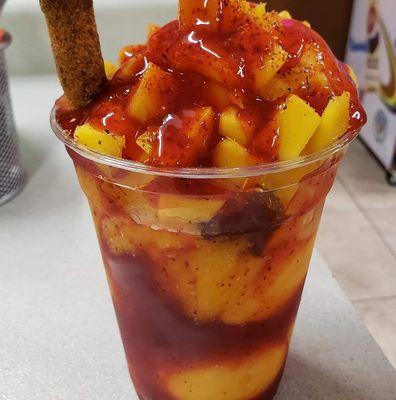 Mexican fruit cup with chamoy sauce and either  Tajin or chili powder. Pretty tasty .