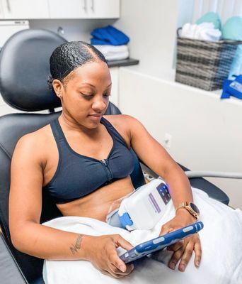 Patient during a CoolSculpting body contouring treatment.