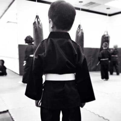 My son second day in his new dojo with his new gear.