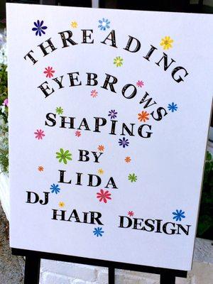 Lisa's poster outside DJ Hair Design