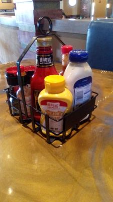 A basket of condiments brought to your table. All clean and fresh. The service was "exceptional."