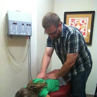 Dr. Williams treating a younger patient