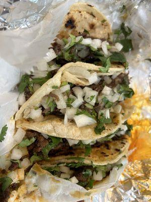 Al pastor tacos and barbacoa tacos