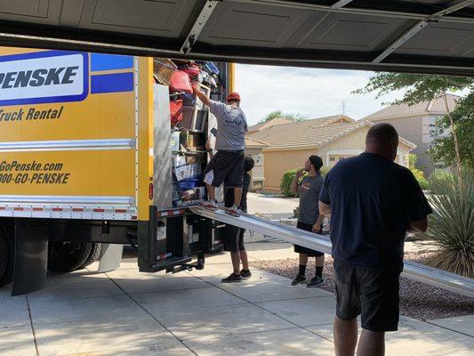 Unloading our Penske truck and moving the items into the proper areas. On time and had great attitudes!