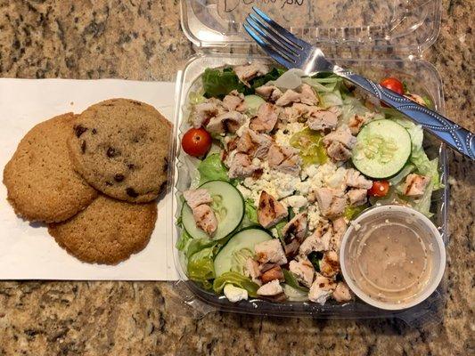 Greek salad with chicken and assorted cookies