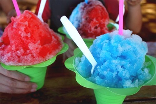 Ice cream in the bottom of petal cup,, ,Color changing spoon and a Hawaiian Lei. North Shore meets North Carolina