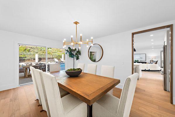 Dining room with cased door opening to kitchen.