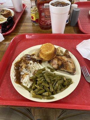 Cafeteria style;  chicken spring beans and white rice with brown gravy.  Damn good homemade just like you're mom makes.