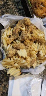 The Pips...Fried chicken tenders served.with Parmesan waffle fries..choice of syrup