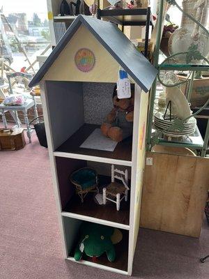 Such a cut doll house or can be used for storage or book shelf.