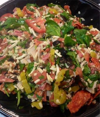 Spicy italian salad, w/ shred mozzarella, spinach, banana peppers, tomatoes, black olives and oil and vinegar. Delish!