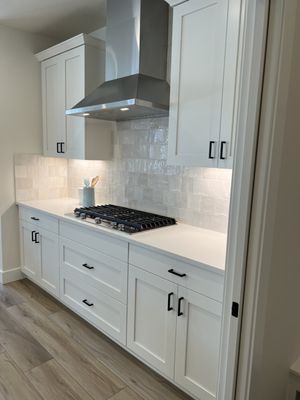 Kitchen with white cabinetry