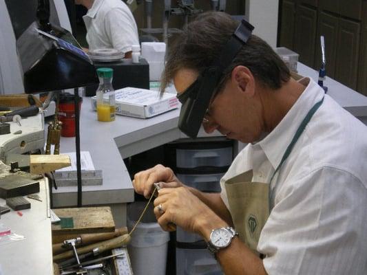 Tim working on a customers jewelry.