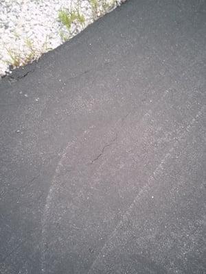 Cracks now align the driveway they installed 1 year ago