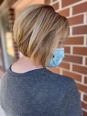 Grey coverage with highlights and a cute little bob.