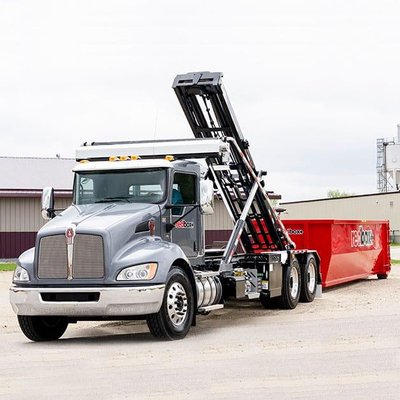 Dropping off on our brand new 30-yard roll off dumpsters for a commercial client with weekly service