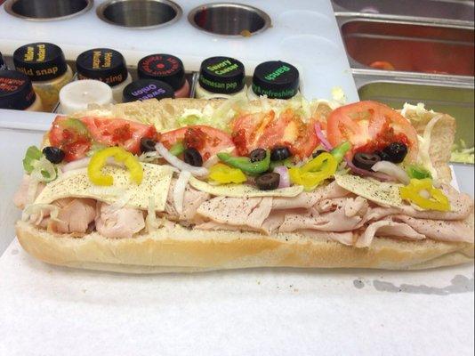 Turkey Sub w/ Banana Peppers, Olives, Lettuce, Tomato, Mayonaise, Oil, Vinegar, Pepper Jack Cheese and Italian Bread