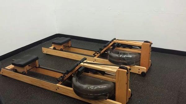 Water rowing machines