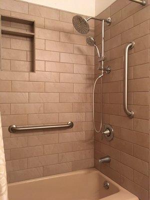 2nd bathroom shower: new tile, shower rail, fixtures, copper plumbing, and 2 shampoo / soap niches (you can only see one in this photo).