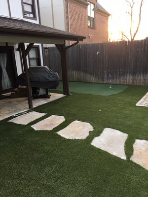 Backyard putting green to make your backyard fun again.