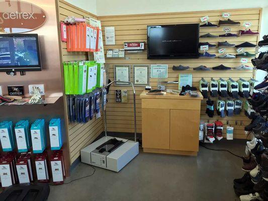 just part of the selection of orthotic supports offered at this shoe store.