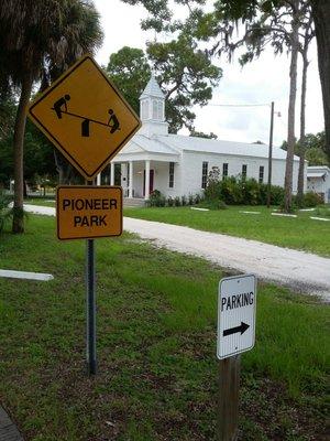 Church next to Pioneer Park, playground, wetlands and tennis courts