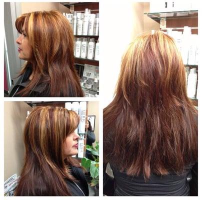 Auburn base with warm highlights, long layers, lots of texture.