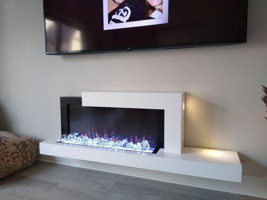 Hanging electric fireplace mounted perfectly!