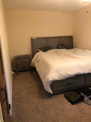 Bed with nightstand