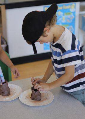 Creating erupting volcanoes in our STEAM class!