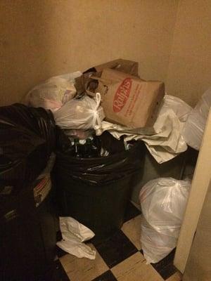 This is what our trash area looks like on the daily in our chic Bev Hills apt.  This brad man is a FILTHY MONSTER of a manager!!