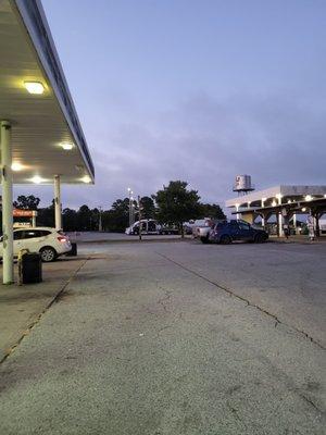 Truck parking to right in large lot