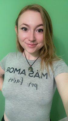 Blonde woman smiling with septum pierced