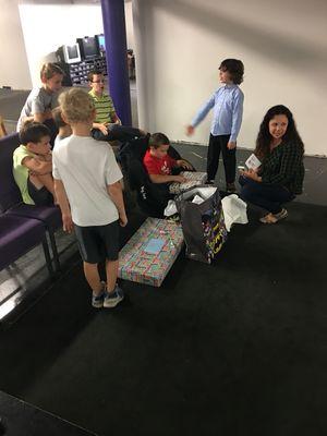 Opening presents from a birthday party we hosted here