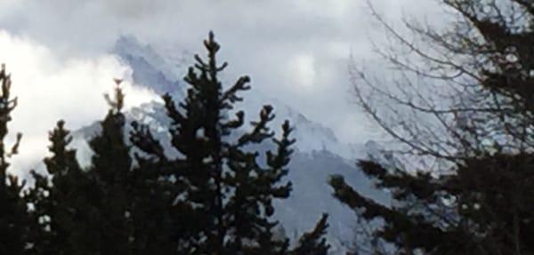 The clouds lifting from ten mile range