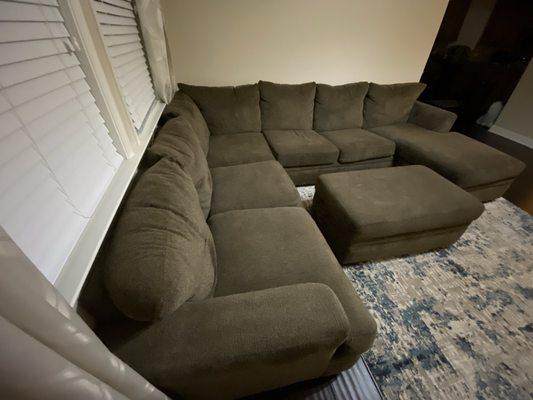 Full sectional moved with care