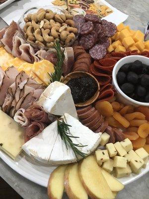 A charcuterie board I put together at one of our many Client Appreciation Parties!