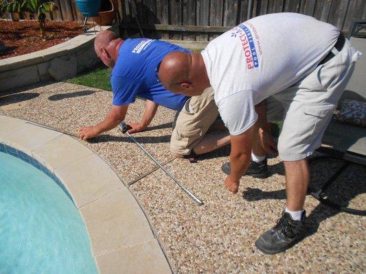 Greg & Greg Laying Out Pool Fence Template