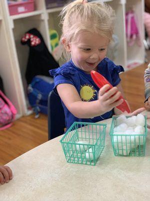 Fine motor skills- Squeezing and transferring.