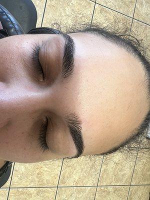 Eyebrow threading