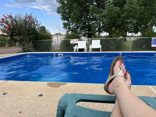 Relaxing beside the pool after a wonderful swim.