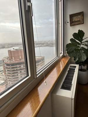 Restored and repolished wood windowsill