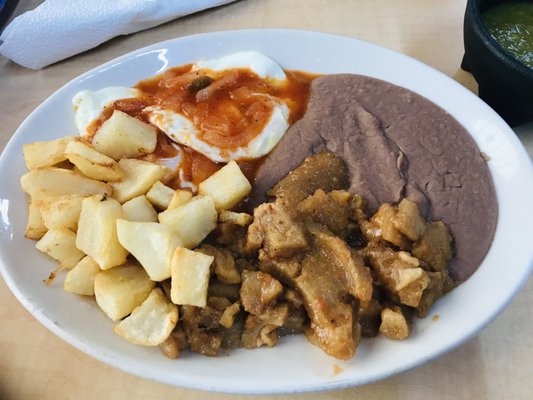 Huevos rancheros with chicharrones con Chile added potatoes.