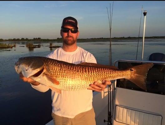 What a great catch! Beautiful redfish in Barataria, just south of New Orleans